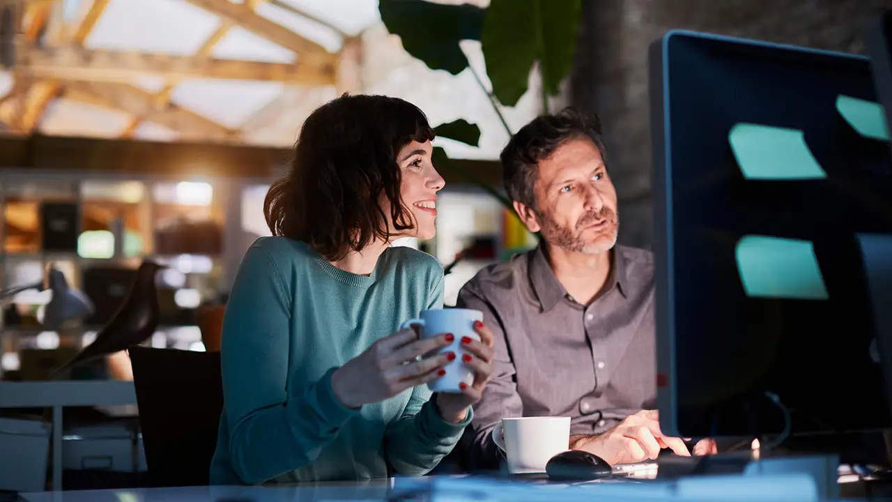 Man and woman learning online